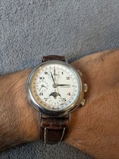 Eberhard & Co. A stainless steel automatic calendar chronograph with moon phase