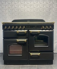RANGEMASTER  CLASSIC LEISURE 110cm FULL GAS RANGE COOKER IN BLACK AND GOLD TRIM.