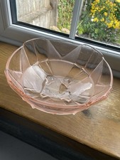 Four footed pink glass trifle/ fruit dish by Sowerby with castellated top rim