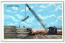 c1920's Unloading Lumber