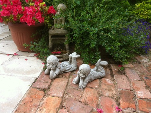 Garden small stone boy - small,