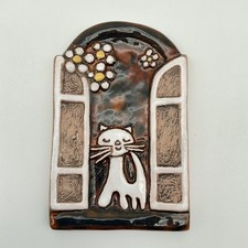 Small Decorative Cat In A