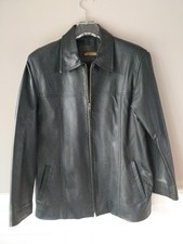 VALENTINO EXCLUSIVE LEATHER JACKET, ARMPIT TO ARMPIT =21 INCH, MEDIUM. GOOD...