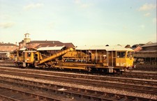 ORIGINAL RAILWAY TRAIN NEGATIVE. Track machine/ballast cleaner at Derby in 1987.