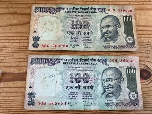 Indian 100 rupee banknotes - x,