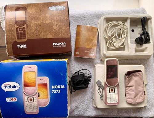 Nokia 7373 pink flip mobile - flip,