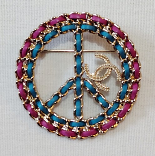 Chanel brooch peace - peace, sign