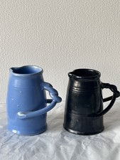 2X  Vintage Dicker Ware Sussex Pottery light blue and black lustre jugs 