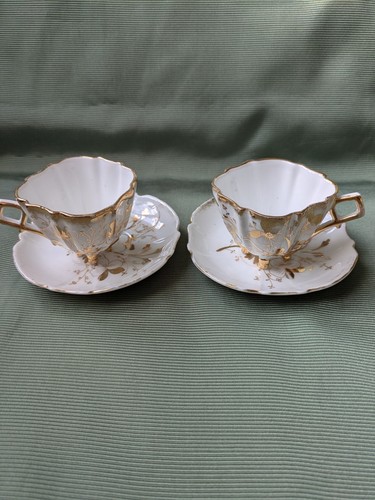 Four footed cups saucers - 2,