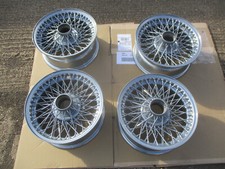 Jaguar Aston  6JK x 15 72 spoke  wire wheels set of 4 powdercoated silver