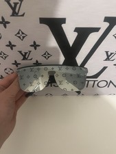 Louis Vuitton  Sun Glasses Black Frames And Got The Brand In Gold On The Frame