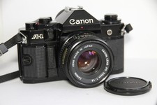 Canon A-1 Black SLR 35mm Film Camera & 50mm F/1.8 Lens. Tested.  Free Warranty.