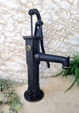 Vintage Cast Iron Village Hand