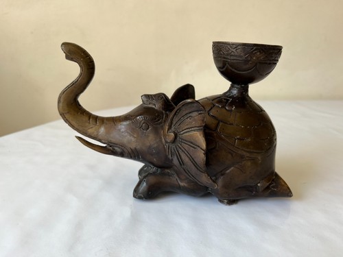 Vintage metal elephant candle
