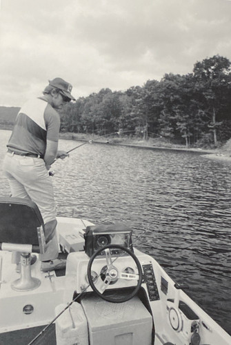 1970s fishermen men reeling - fishermen,