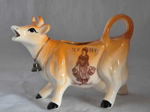 Vintage brown cow - , milk