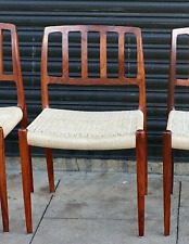 A single vintage Niels.O. Moller 83 Rosewood Dining Chair with woven seat