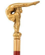 A bronze-handled walking stick