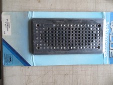 CLASSIC CAR RADIO SPEAKER GRILL  7X2 1/2 INCH N.O.S.