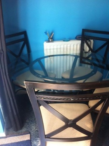 Glass iron table with four - with,
