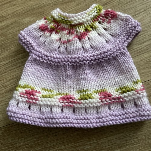 Hand knitted dolls dress - hand,