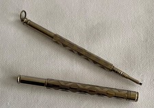 Silver Plate Engine Turned Bright Cut Pencils x 2. One propelling