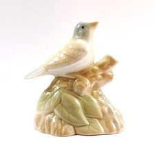Vintage bird figurine ornament