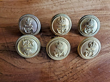 Seven brass naval buttons by
