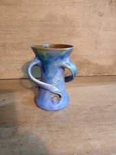 Three Handle Pottery Vases By