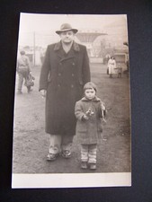 Man & Child at Fairground Ride