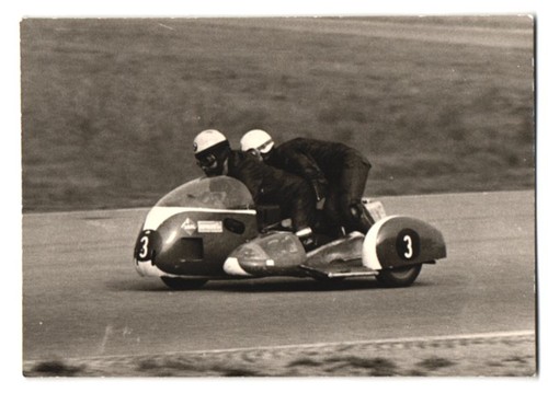 Photograph motorcycle racing