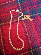 Vintage Trifari Gold Tone Knot