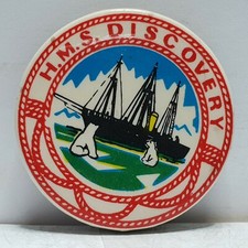 HMS Discovery tin badge