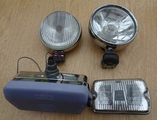 Four chrome fog / spot lamps, 2 x Cibie, 1 Wipac and 1 Butlers