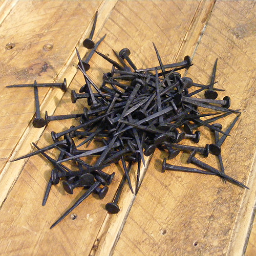 Hand forged blacksmith nails - hand,