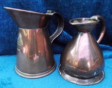 Two Old Copper Measure Jugs