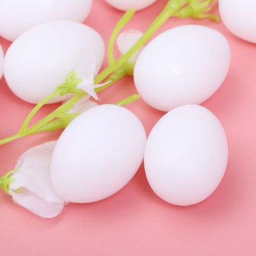 Plastic fake pigeon eggs solid - fake,