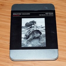 Sebastiao Salgado mini jigsaw 100 piece puzzle, in metal tin, never used