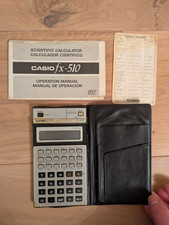 Casio FX-510 Scientific Calculator with user manual & wallet case