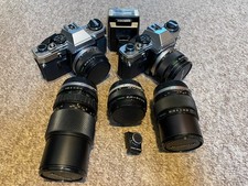 2 x Olympus OM10 35mm SLR Camera Bodies with 5 x Lenses, Manual Adaptor & Flash