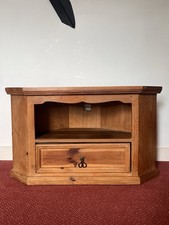 A  Beautifully Simple sturdy solid pine corner TV unit.