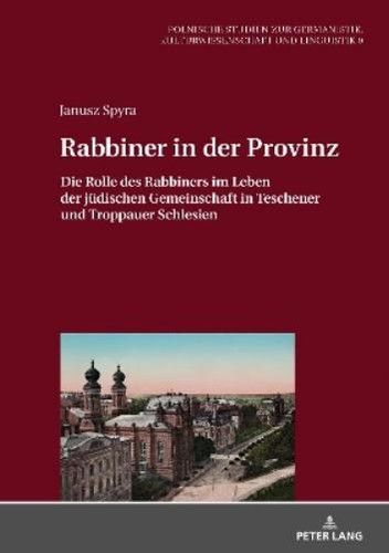 Janusz spyra rabbiner - in, der