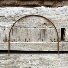 Rusty metal half circle hoop - half,