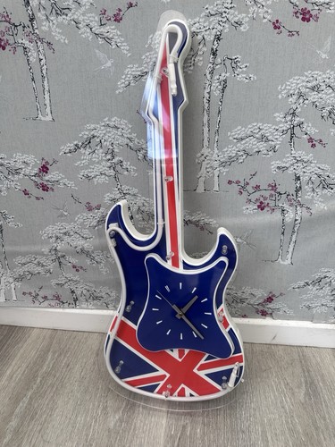 Neon guitar clock 1990 - , uk