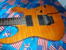 BEAUTIFUL  IBANEZ RG320 GUITAR  AAA FLAME MAPLE  AMBER , FULLY SET UP !