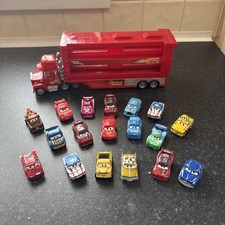 Disney Cars Pixar Minis Hauler and 18 cars 