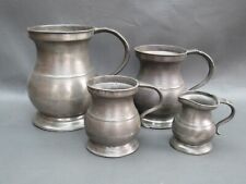 Set of 4 old graduated pewter measures or tankards for display - quart pint etc