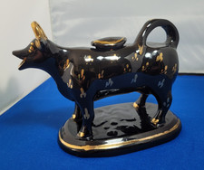 Antique Black and Gold Cow