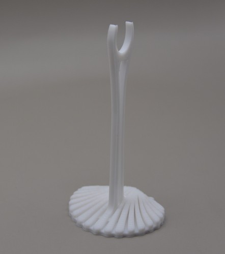 Shell shaped stand for - for, pippa