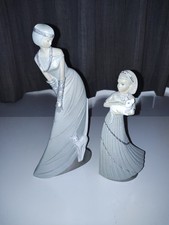A Pair of Vintage Enesco Ivory